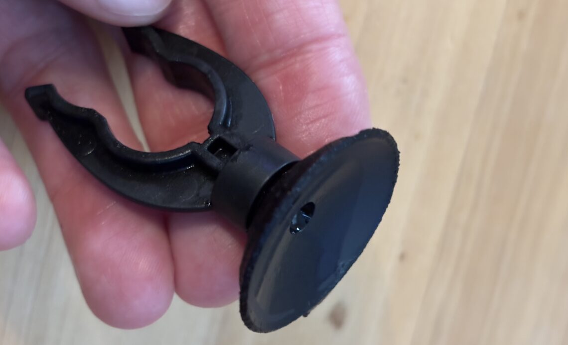 close up of a worn aquarium suction cup